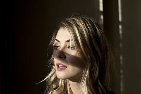 Rosamund Pike shows off her stunning figure in lingerie magazine shoot ...